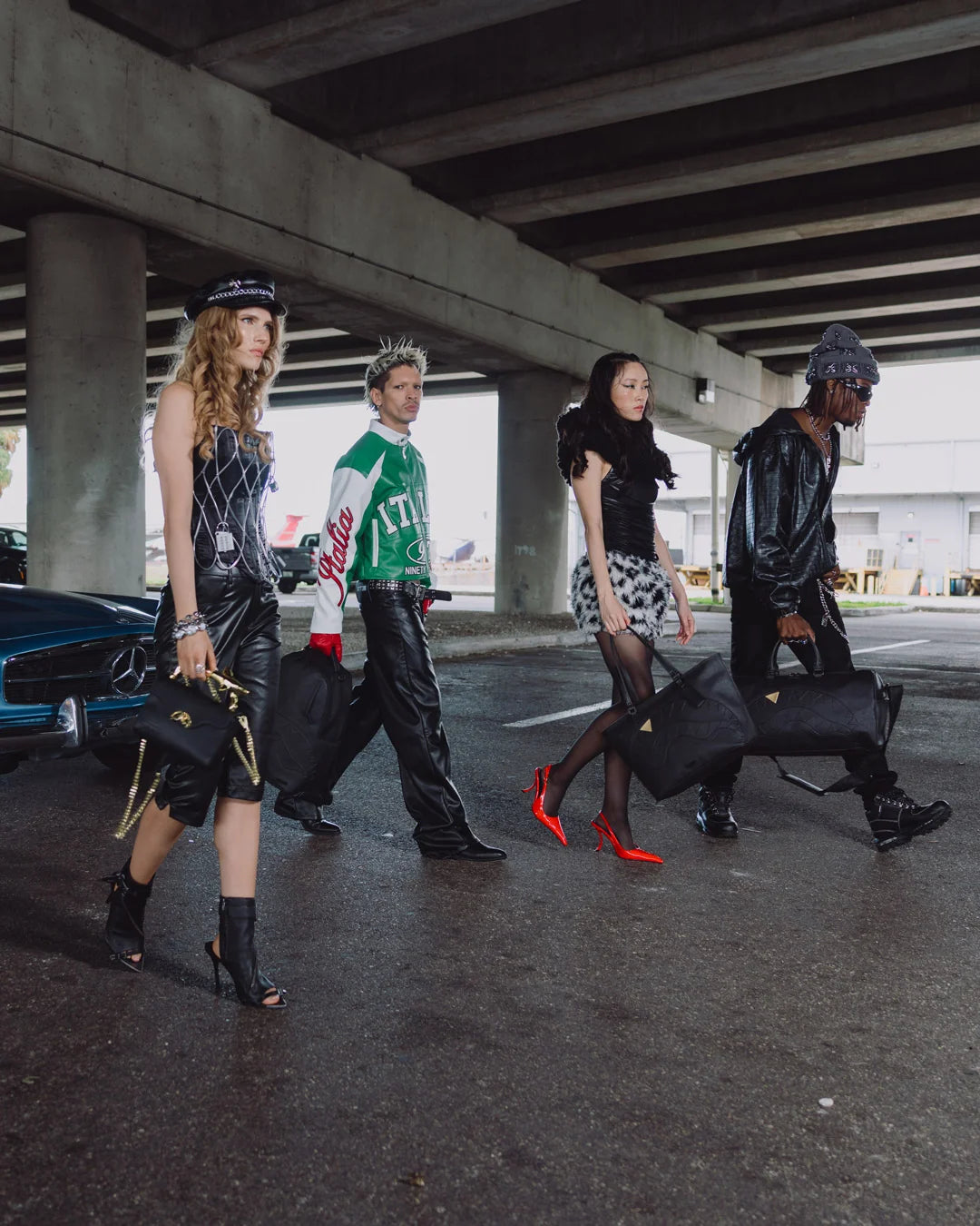 BLACKED OUT EMBOSSED GOLD TOOTH DUFFLE