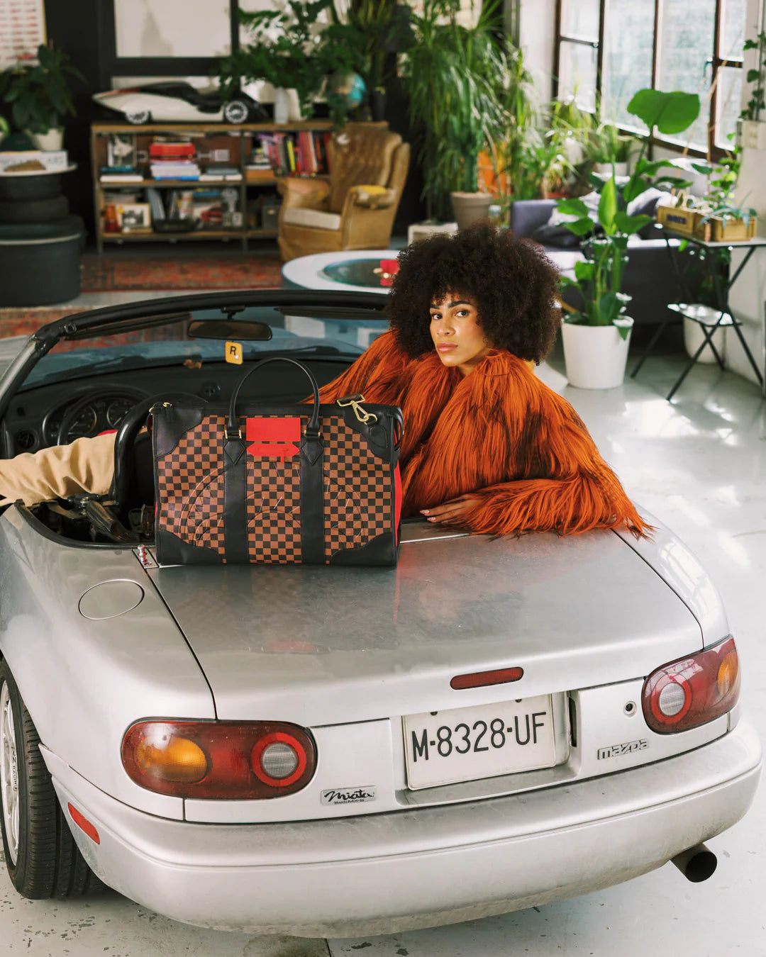 RED REDEMPTION PYRAMID DUFFLE