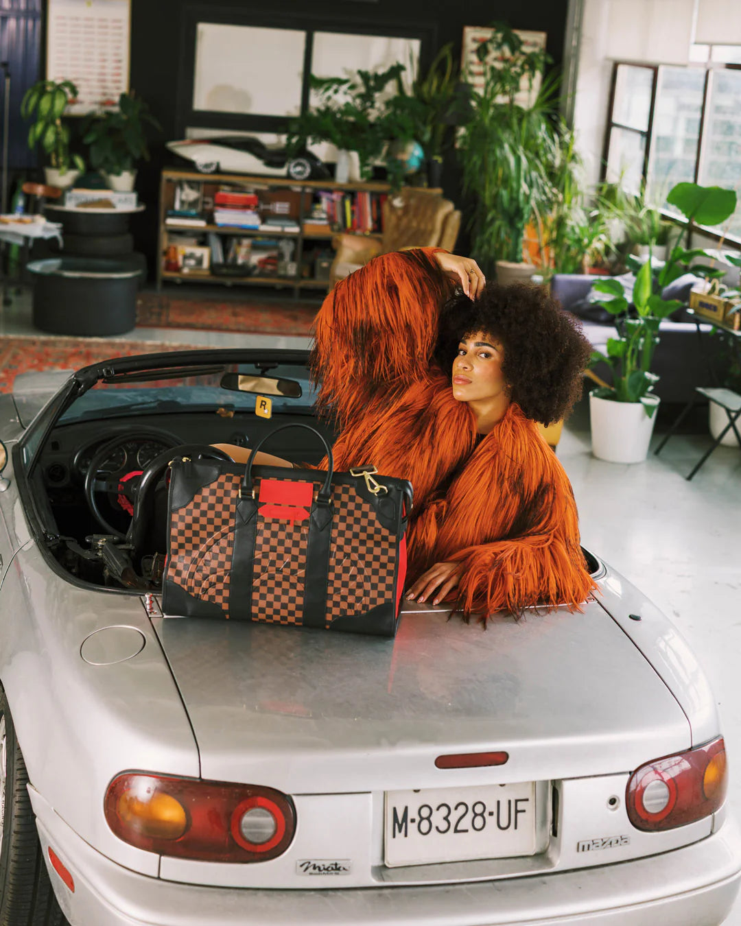 RED REDEMPTION PYRAMID DUFFLE