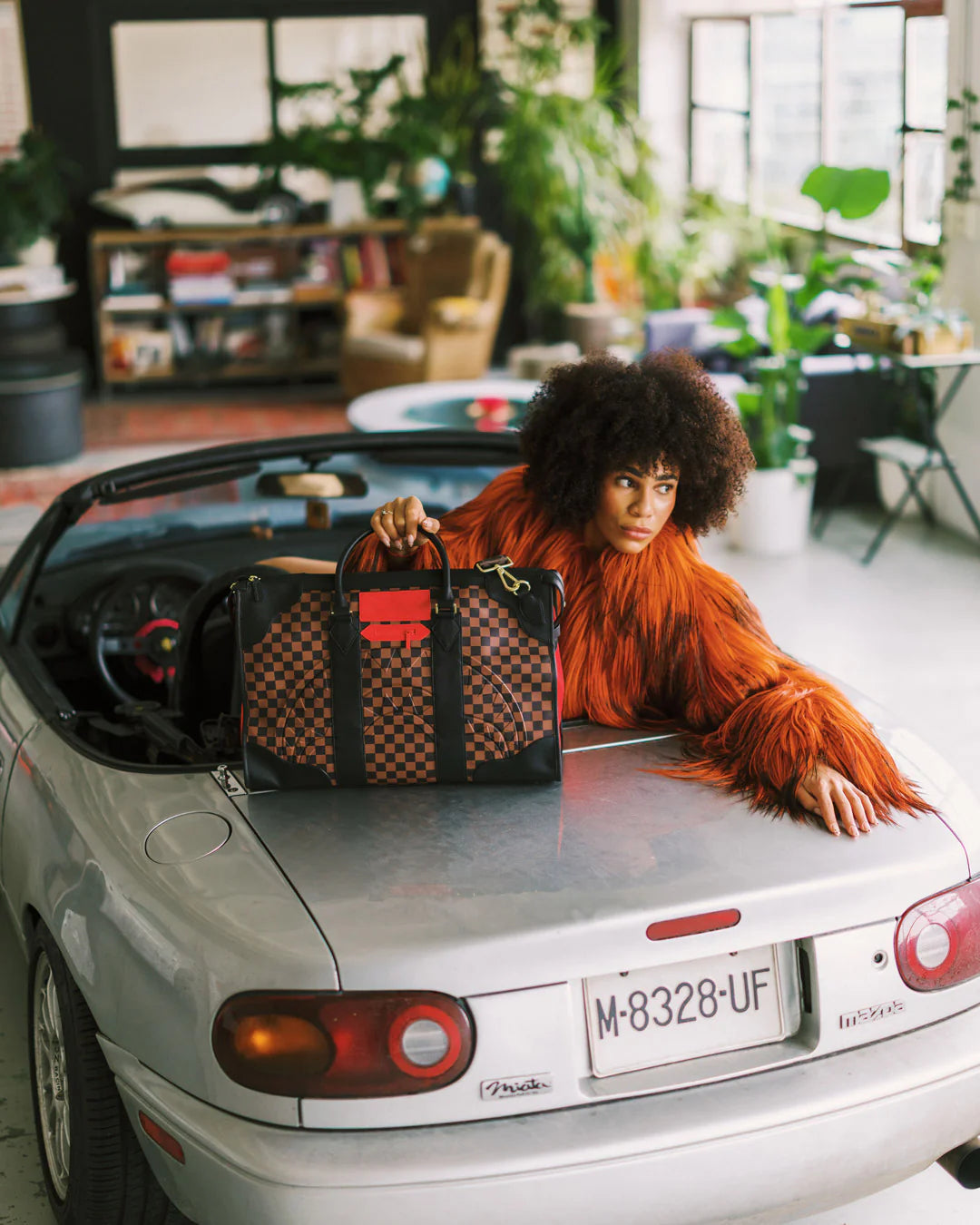 RED REDEMPTION PYRAMID DUFFLE