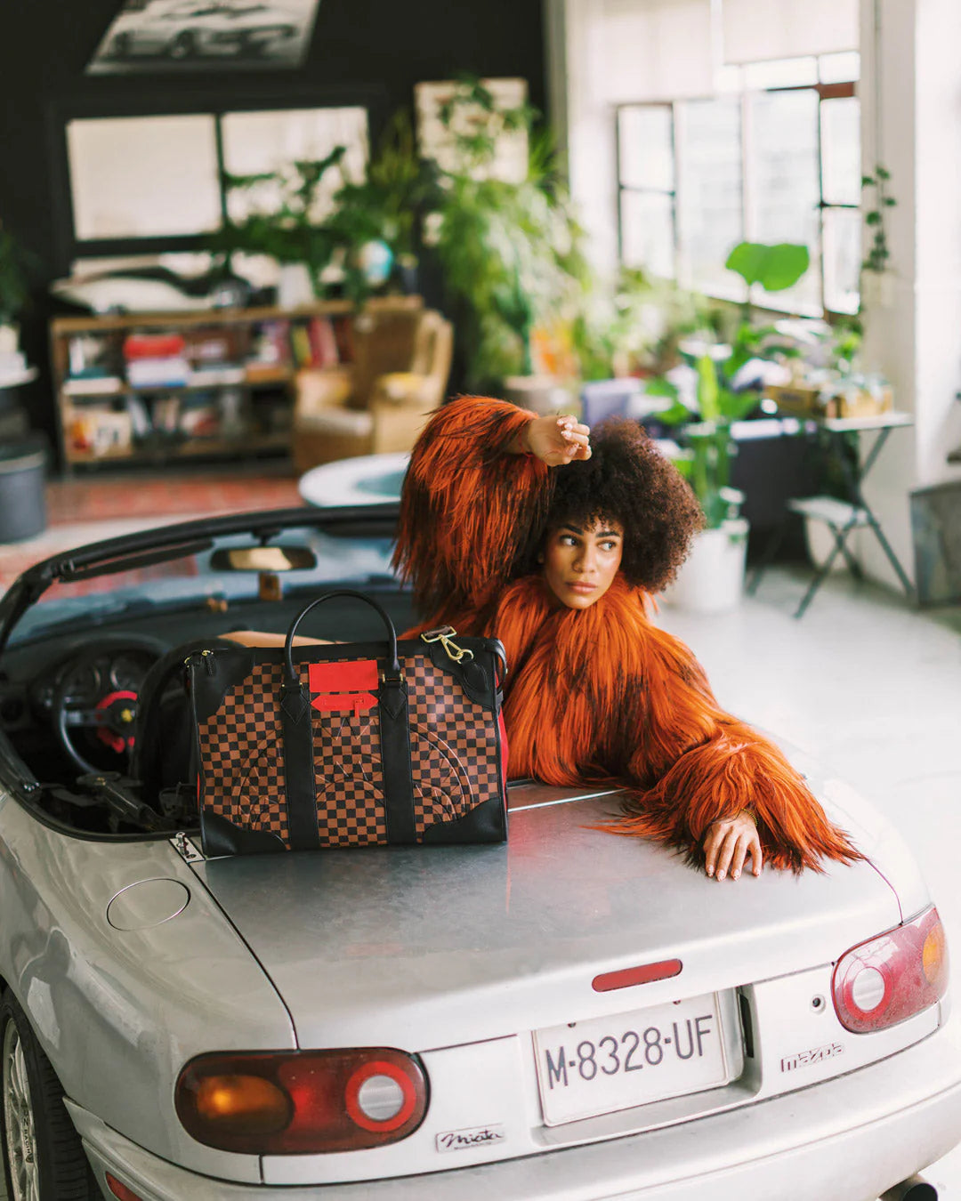 RED REDEMPTION PYRAMID DUFFLE