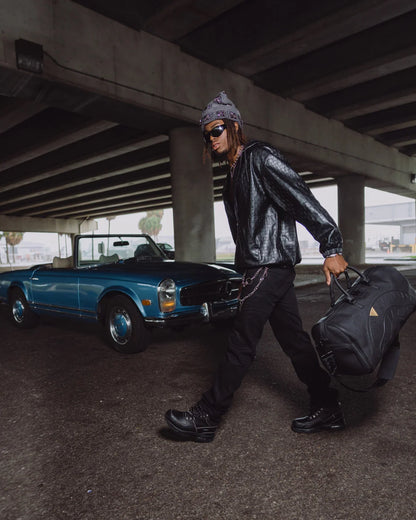 BLACKED OUT EMBOSSED GOLD TOOTH DUFFLE