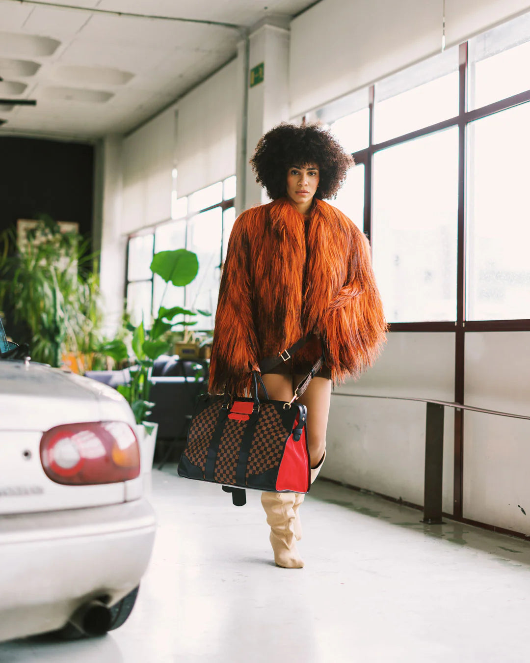 RED REDEMPTION PYRAMID DUFFLE