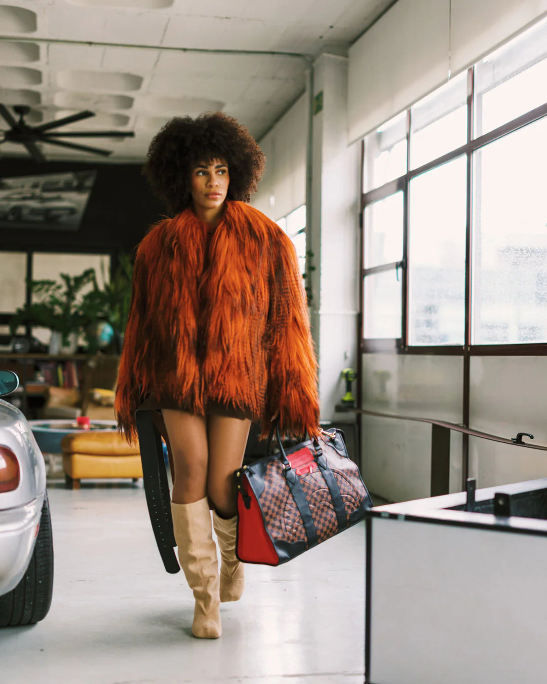 RED REDEMPTION PYRAMID DUFFLE