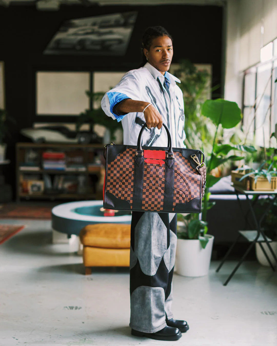 RED REDEMPTION PYRAMID DUFFLE