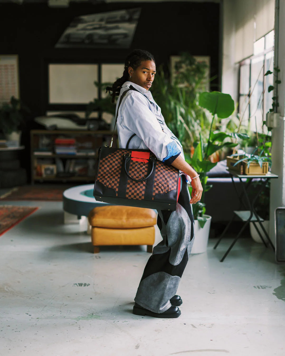 RED REDEMPTION PYRAMID DUFFLE