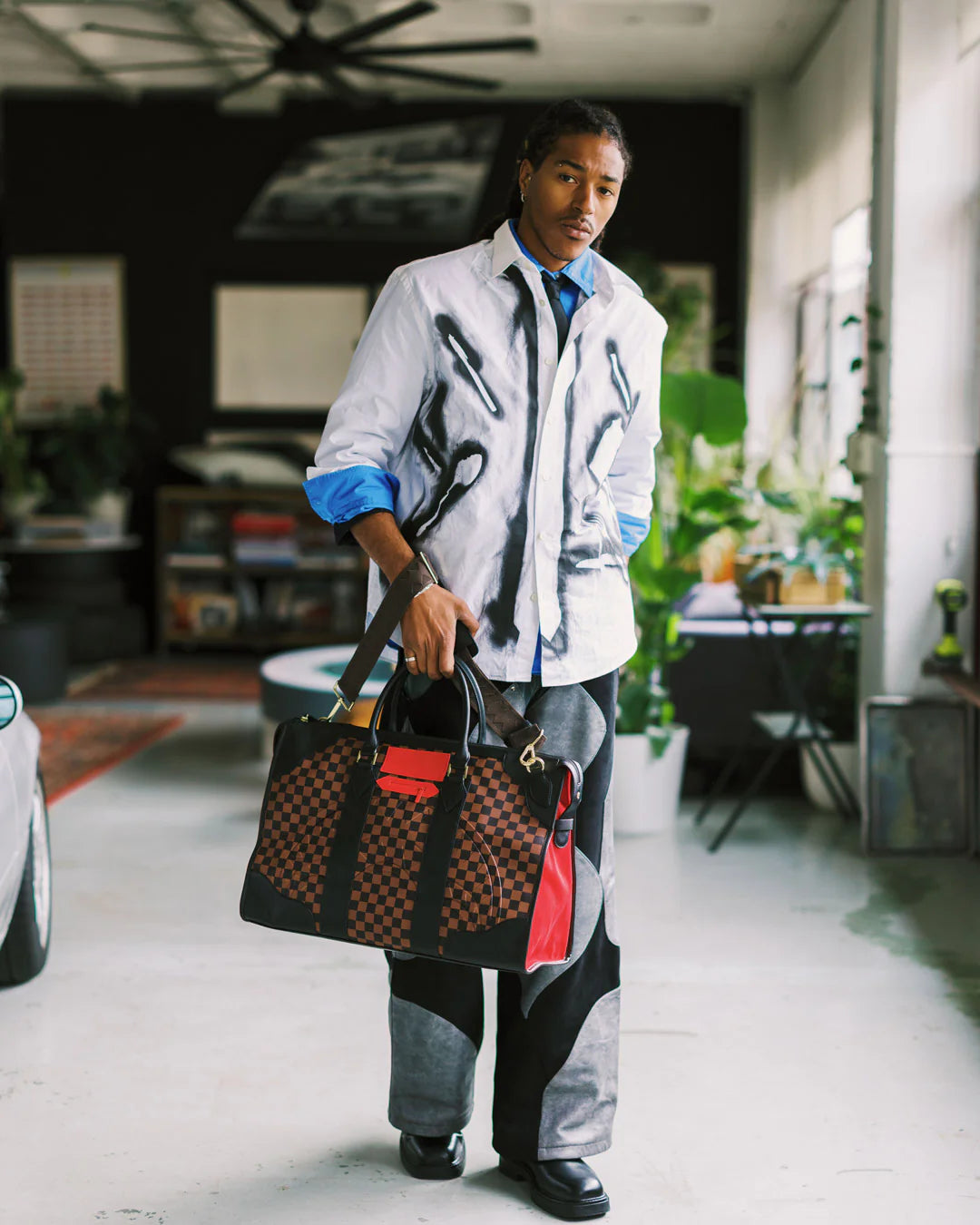 RED REDEMPTION PYRAMID DUFFLE