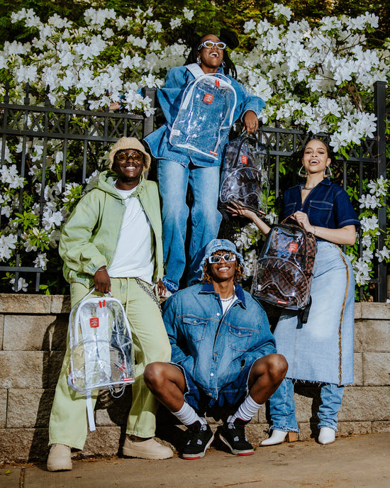 CLEAR EMBOSSED SHARKS IN PARIS DLXSV BACKPACK