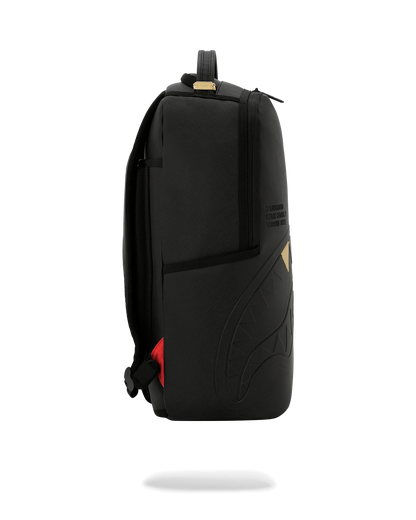 BLACKED OUT EMBOSSED GOLD TOOTH DLXSV BACKPACK