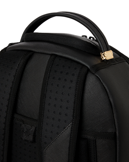 BLACKED OUT EMBOSSED GOLD TOOTH DLXSV BACKPACK