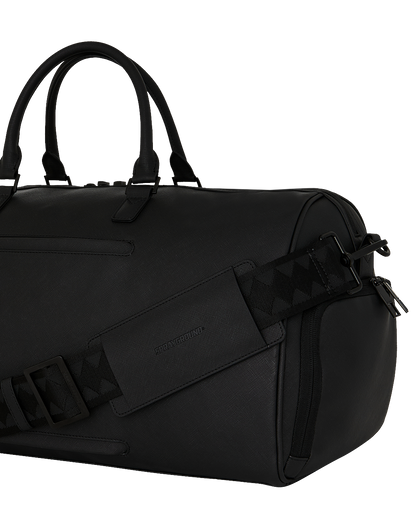 BLACKED OUT EMBOSSED GOLD TOOTH DUFFLE